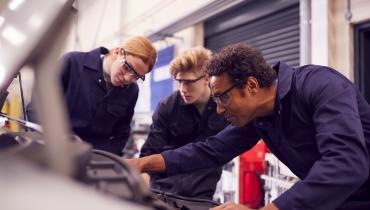technicians working on a car